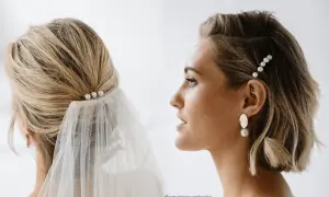 Elegancka fryzura boho z krótkimi włosami, ozdobiona perłowymi wsuwkami i welonem.